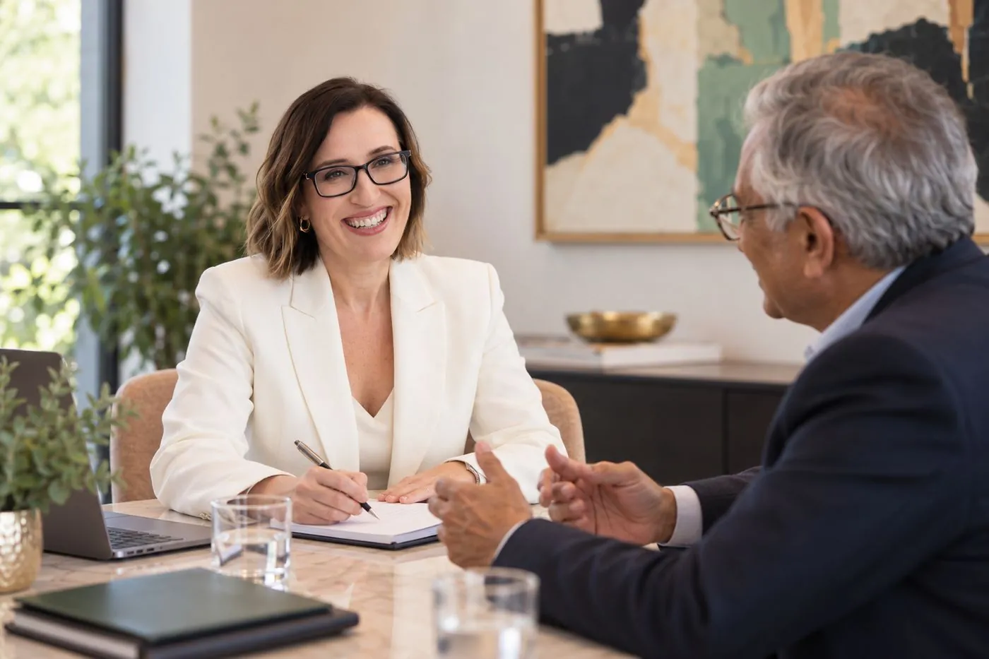 Sophie Pettigrew meeting with a client across a table